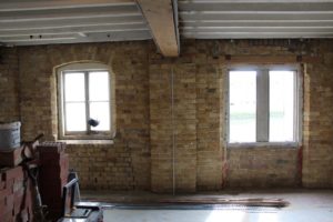 Photo 1: Internal view showing former loading bay door