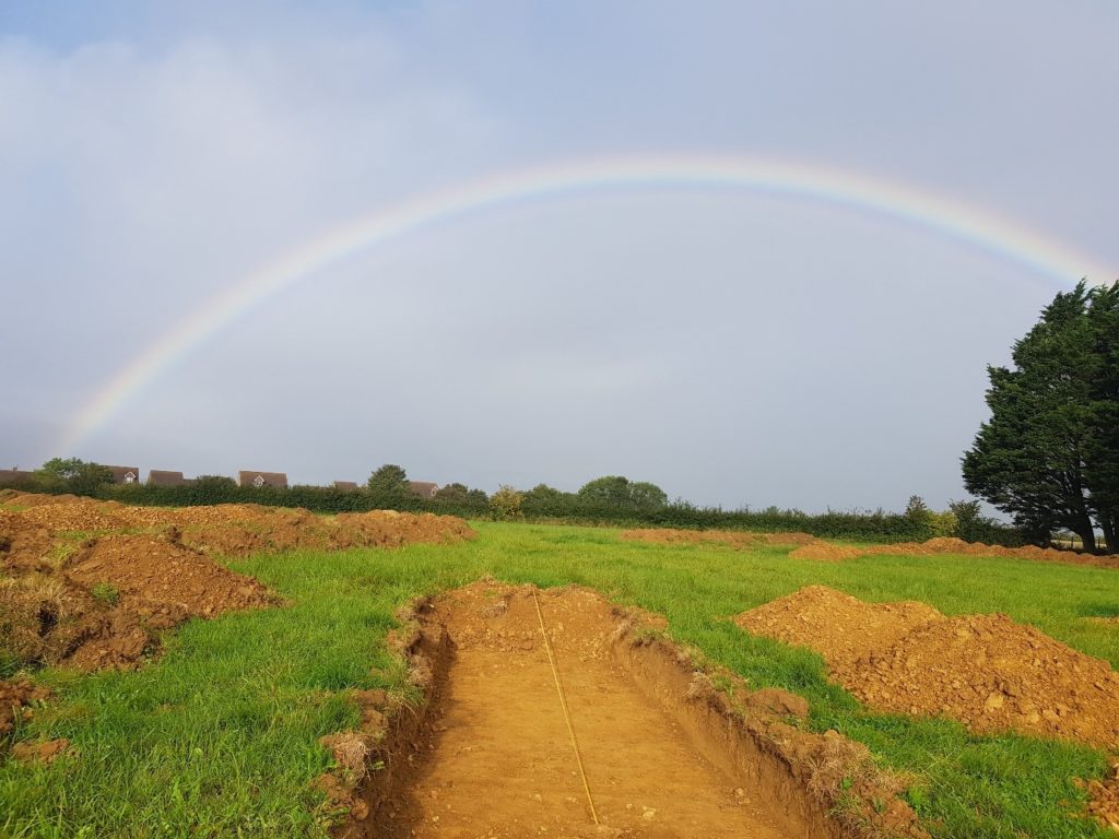 Rainbow over trench