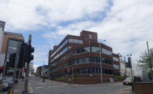 Photo 1: view towards Lambert House at the crossroads with Talbot Street and Clarendon Street - (use Plate 1 in report)