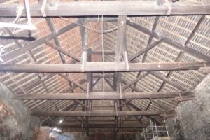 Photo 2 View looking E showing detaul of queenpost roof trusses