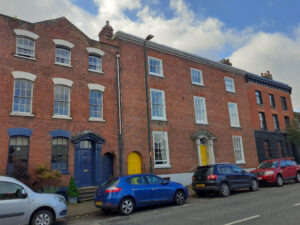 Photo 1: View southwest showing Grade II listed late Georgian townhouses at Nos. 18, 20 & 22 Etnam Street