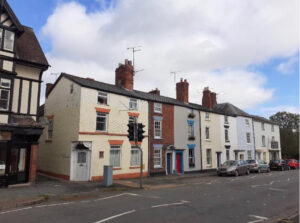 View looking northeast showing row of Grade II listed houses at Nos. 77-85 Etnam Street including the former Dukes Arms public house